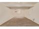 Spacious finished basement featuring neutral carpet, bright lighting, and multiple doors for easy access at 3735 S Lewiston St, Aurora, CO 80013