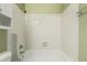 Bathroom with a tiled shower and bathtub combination at 3735 S Lewiston St, Aurora, CO 80013