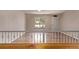 Bright entryway features wood floors, a view of the front yard, and a white front door at 3735 S Lewiston St, Aurora, CO 80013