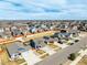 An aerial view of a neighborhood with a mix of single-Gathering homes and well-maintained streets at 6707 6Th St, Frederick, CO 80530