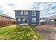 A charming backyard featuring lush green grass and rock landscaping for outdoor enjoyment at 6707 6Th St, Frederick, CO 80530
