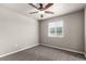 Comfortable bedroom with neutral walls, carpet, ceiling fan and window at 6707 6Th St, Frederick, CO 80530