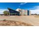 Exterior of a modern gymnastics building with glass facade and well-maintained landscaping at 6707 6Th St, Frederick, CO 80530
