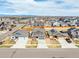 An aerial view shows a residential neighborhood with beautiful mountain views at 6707 6Th St, Frederick, CO 80530