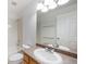 Well-lit bathroom featuring a single sink vanity, and shower-tub combination at 6833 E 115Th Ave, Thornton, CO 80233