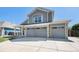 Charming two-story home featuring a two-car garage and covered porch entrance at 6833 E 115Th Ave, Thornton, CO 80233