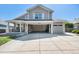 Charming two-story home with a spacious two-car garage and inviting covered front porch area at 6833 E 115Th Ave, Thornton, CO 80233