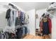 Walk-in closet featuring custom shelving and racks at 6833 E 115Th Ave, Thornton, CO 80233