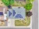 Overhead view of home with solar panels, spacious backyard, and well-kept landscaping, highlighting the property's features at 10925 W Montana Pl, Lakewood, CO 80232