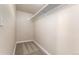 Walk-in closet with neutral carpeting and a shelf for optimal organization at 2965 Ivy St, Denver, CO 80207