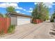 Detached garage with ample parking and alley access at 2965 Ivy St, Denver, CO 80207