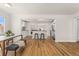 Open floorplan with bright living space features seamlessly connected kitchen and dining areas at 2965 Ivy St, Denver, CO 80207