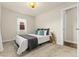 Bedroom with neutral colors, natural light and hardwood floors in the ensuite bathroom at 2965 Ivy St, Denver, CO 80207