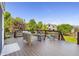 Relaxing deck with comfortable outdoor seating and scenic views at 9745 Hummingbird Pl, Littleton, CO 80125