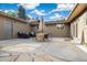 Outdoor patio features neutral toned furniture, and stone walkway at 10380 W Warren Ave, Lakewood, CO 80227