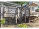 Rustic chicken coop with secure wire enclosure, providing a safe and natural environment for poultry at 10380 W Warren Ave, Lakewood, CO 80227