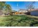 Spacious backyard with lawn at 620 Newport St, Denver, CO 80220