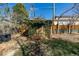 Brick shed adorned with ivy, providing a charming and functional space for storage or hobbies at 620 Newport St, Denver, CO 80220