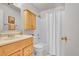 Full bathroom features a vanity, toilet, and shower-tub combination at 1030 Kohl St, Broomfield, CO 80020