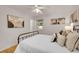 Bright bedroom with a comfortable bed and stylish neutral decor at 1030 Kohl St, Broomfield, CO 80020
