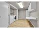 Bright laundry room featuring a new washer and dryer at 1030 Kohl St, Broomfield, CO 80020