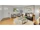 Bright living room with modern decor, stylish furniture, and large windows at 1030 Kohl St, Broomfield, CO 80020