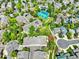 Aerial view of the property with manicured green spaces, and neighborhood amenities at 3426 W 98Th W Dr # A, Westminster, CO 80031
