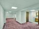 Large, versatile basement area with plush carpeting and neutral walls leads to a bathroom at 3426 W 98Th W Dr # A, Westminster, CO 80031
