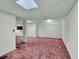 Spacious basement with plush carpeting, drop ceiling, and bright recessed lighting at 3426 W 98Th W Dr # A, Westminster, CO 80031