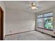 Bright bedroom with dual windows and a ceiling fan for optimal comfort at 3426 W 98Th W Dr # A, Westminster, CO 80031