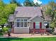 Inviting home with brick accents, awning, and well-kept landscaping at 3426 W 98Th W Dr # A, Westminster, CO 80031