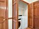 Convenient laundry area with washer and dryer hookups inside a closet with bi-fold wood doors at 3426 W 98Th W Dr # A, Westminster, CO 80031