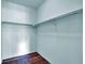 Walk-in closet with wood floors and ample hanging space at 3426 W 98Th W Dr # A, Westminster, CO 80031