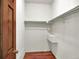 Walk-in closet with wood floors and ample hanging space at 3426 W 98Th W Dr # A, Westminster, CO 80031