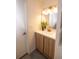 Bright bathroom featuring stylish lighting, updated vanity, modern sink, and a clean aesthetic at 2300 S Krameria St, Denver, CO 80222