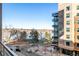 Balcony offering city, water, and park views at 4200 W 17Th Ave # 311, Denver, CO 80204