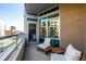 Private balcony with seating area and city views at 4200 W 17Th Ave # 311, Denver, CO 80204