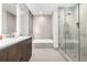 Elegant bathroom featuring a soaking tub, shower, and double vanity at 4200 W 17Th Ave # 311, Denver, CO 80204