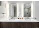 Double vanity bathroom with modern fixtures and sleek design at 4200 W 17Th Ave # 311, Denver, CO 80204