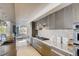 Modern community kitchen with stainless steel appliances at 4200 W 17Th Ave # 311, Denver, CO 80204