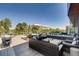 Relaxing outdoor patio with seating, fire pit, and views at 4200 W 17Th Ave # 311, Denver, CO 80204