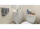 Clean bathroom with a white vanity and tiled floor at 7755 E Quincy Ave # 101, Denver, CO 80237