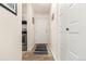 Inviting entryway with access to kitchen and closets at 7755 E Quincy Ave # 101, Denver, CO 80237