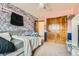 Charming bedroom with floral wallpaper, closet and ceiling fan at 10529 Vaughn Way, Commerce City, CO 80022