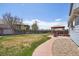 Large backyard with patio, gazebo, lawn, and privacy fence at 11416 E 114Th Ave, Commerce City, CO 80640