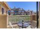 Balcony with a view of the surrounding neighborhood and open space at 9546 Firenze Way, Highlands Ranch, CO 80126