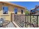 Balcony view with seating and overlooking the lawn at 9546 Firenze Way, Highlands Ranch, CO 80126
