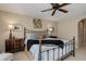 Bright bedroom with a comfortable bed, decorative pillows, and soft lighting at 9546 Firenze Way, Highlands Ranch, CO 80126