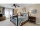 Cozy bedroom with soft lighting and a comfortable bed with decorative pillows at 9546 Firenze Way, Highlands Ranch, CO 80126