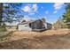 Backyard featuring a large deck and a grilling area at 6200 Bow Meadows Dr, Elizabeth, CO 80107